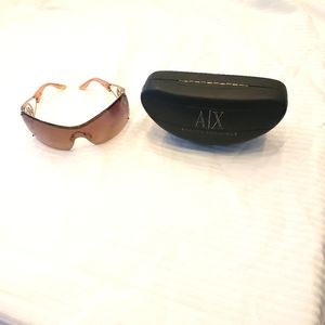 Armani Women's Sunglasses with smoky lense.